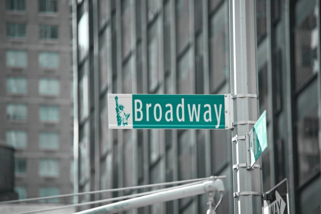 A close-up of the Broadway street sign in NYC.