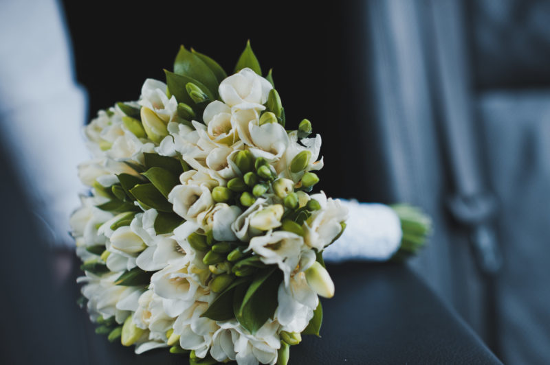 Bouquet of white tulips on the table