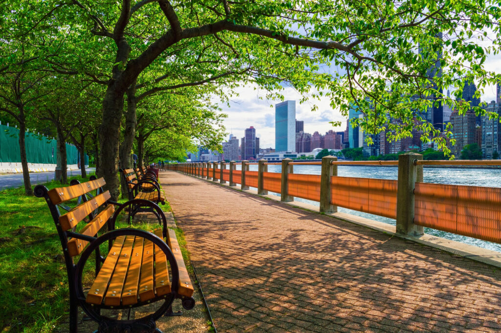 A walking path along the East River - one of the top things to do in nyc in summer